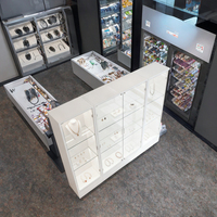 Table de présentation de bijoux de conception moderne personnalisée, comptoir et vitrine de bijoux personnalisés avec éclairage LED