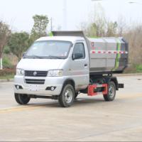 Mini camion à ordures compacteur diesel à chargement latéral avec crochet latéral, boîte de vitesses manuelle, transmission 4x2, pompe pour bacs de 120L/240L