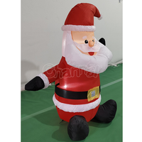 Vente en gros d'usine - Décoration de jardin gonflable classique Père Noël - Père Noël assis gonflable pour l'extérieur