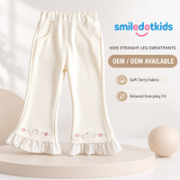 Pantalon évasé pour filles en gros, taille élastique, avec broderie cœur lapin et ourlet à volants en dentelle, vêtements de boutique pour enfants mignons