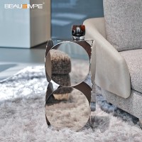 Table d'appoint en travertin minimaliste avec dessus en verre artisanal & base en pierre naturelle, personnalisable pour salon