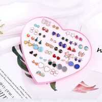 Vendita calda di tendenza gotico croce fiocco orecchini di perle per le donne stile religioso materiale principale ottone per feste all'ingrosso - Product Image 1