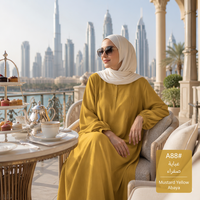 Robe longue minimaliste légère en tissu froissé avec buste froncé et manches longues à revers, coupe trapèze |   Abaya décontractée ample pour musulmanes au quotidien