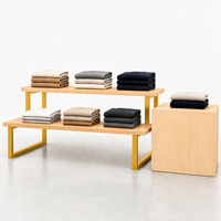 Table de présentation en bois à deux niveaux, noire, avec pieds en U, présentoir de vêtements pliable pour îlot commercial, socle pour logo, vente en gros