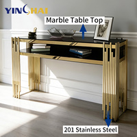 Table console de luxe en acier inoxydable 201 avec cadre en métal doré sur mesure, plateau en verre noir, mobilier pour suite d'hôtel