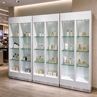 Vitrine d'exposition en verre LED MDF blanc de luxe, sur mesure, pour salon de beauté, présentoir cosmétique pour produits de soin de la peau, magasin de vente au détail