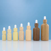 10ml 15ml 20ml 30ml 50ml 100ml flacon compte-gouttes de sérum en bois de bambou huile essentielle bouteilles en verre de carton emballées séparément