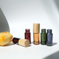 Flacon en verre miniature coloré personnalisé de 5 ml avec bouchon en bambou pour huile essentielle ou parfum
