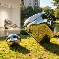 Sculpture abstraite en acier inoxydable poli miroir, forme de galet métallique, pour la décoration extérieure de jardin et de paysage
