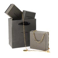 Petite boîte d'emballage de bijoux en carton gris personnalisée pour la Saint-Valentin Ensemble de boucles d'oreilles et colliers de style occidental Éponge personnalisée