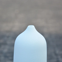 Meilleure vente bon prix Diffuseur d'arômes électronique à ultrasons en céramique à grain de bois avec pierre de parfum et veilleuse à DEL de 7 couleurs