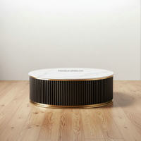 Table basse moderne avec plateau en pierre frittée, cadre en bois noir et acier inoxydable doré pour salon, avec rangement
