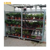 Chariot de transport de jardin en acier roulant OEM pour pépinière, pot de fleurs, plantes avec roues