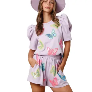 Satu set pakaian wanita dua potong pabrikan profesional setelan desainer kustom payet kupu-kupu logo berkilau