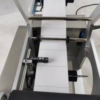 Machine d'étiquetage semi-automatique à bas prix pour bouteilles rondes/machine d'impression d'étiquettes de bouteilles en PET