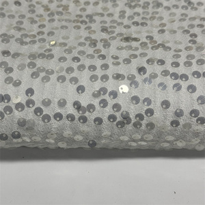 Telas de punto de poliéster 100% bordadas en blanco y lentejuelas transparentes de 6MM para ropa, exquisitas, a la venta, a la venta - Product Image 1