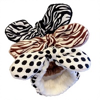Bandeau en peluche imprimé léopard pour femme, idéal pour le lavage du visage, le maquillage et les masques