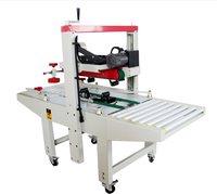 Machine d'emballage électrique pour sceller les boîtes en carton, machine à sceller les boîtes en carton