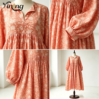 Fabrication OEM Robe midi coupe trapèze à taille haute, col à revers, manches lanternes, imprimé floral orange, vente en gros d'usine