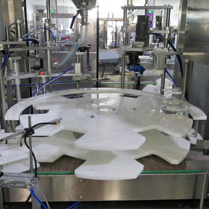 Machine rotative à tête unique pour grands fûts d'huile 1L-10L Placement manuel du couvercle Capsulage automatique Une <span class=keywords><strong>unit</strong></span>é pour les emballages en verre de remplissage de gel - Product Image 2