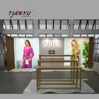 Support d'affichage robuste et durable pour événements, idées de présentoirs personnalisés pour salons professionnels de vêtements, comptoirs de stand.