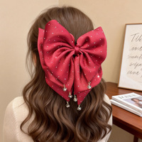 Pince à cheveux vintage élégante et polyvalente avec nœud rouge délicat, accessoire de mariage pour queue de cheval mi-haute, pince requin