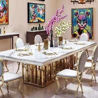 Ensemble de table à manger rectangulaire en marbre avec base en acier inoxydable durable de style nordique moderne et luxueux pour 8 personnes