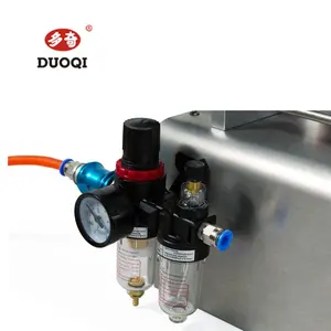 DUOQI G2WTD الأفقي نوع معجون السائل 2 رئيس فوهات مزدوجة ماكينات تعبئة للعسل عصير المنظفات