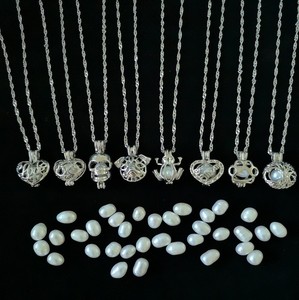 Collier avec pendentif en forme de <span class=keywords><strong>cage</strong></span> à perles d'eau douce, crâne d'éléphant, cœur ouvert, vente en gros pour les fabricants - Product Image 6