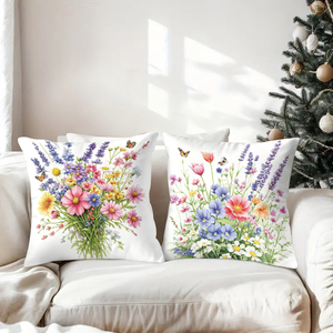 Almohadas florales que decoran un sofá acogedor con medias navideñas y astas de ciervo en el fondo - Product Image 3