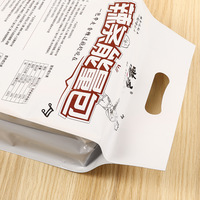 Sachet personnalisé imprimé à quatre soudures avec poignée découpée, pochette plate pour l'emballage de snacks épicés en bande