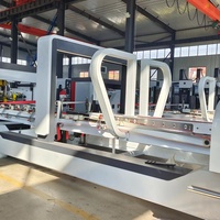Machine intégrée entièrement automatique de couture, collage et clouage pour la fabrication de boîtes en carton