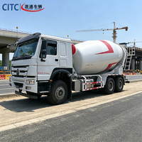 Camion malaxeur à béton SINOTRUK HOWO à chargement automatique, 10 roues, à faible résidu de malaxage, mobile, pour le dosage de béton en travaux d'ingénierie