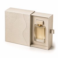 Boîte à parfum en papier avec couvercle incurvé et bordure champagne pour une présentation de luxe des parfums, présentoir haut de gamme
