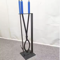 Pince à brasero portable de haute qualité avec crochet, poignée bleue, construction métallique, finition thermolaquée pour le camping en extérieur