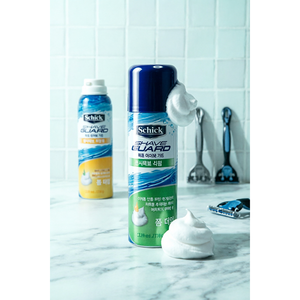 Espuma de afeitar Schick Shave Guard 210g para piel sensible, cuidado diario - Product Image 1