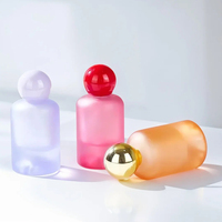 Bouteille de parfum en verre de parfum à fond volcanique coloré givré personnalisé de luxe de 30ml 50ml 100ml avec bouchon à bille