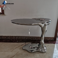 Table basse en acier inoxydable liquide - Finition miroir - Design à effet d'ondulation de l'eau - Moulage par compression de précision - JIANGXIN YSJJ-018