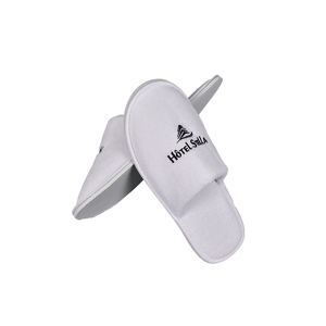 Nouveauté Chaussons d'hôtel jetables blancs en tissu de velours corail doux de luxe - Product Image 2