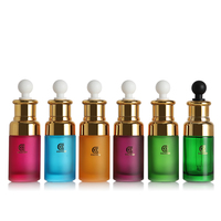 Bouteille en verre ronde colorée unique de 50ml avec compte-gouttes et bouchon en aluminium à vis pour diffuseur et emballage