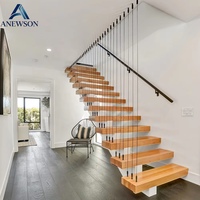 Escalier intérieur durable à monopoutre en acier galvanisé, résistant aux intempéries, pour appartements et hôtels, idéal pour terrasses et aménagements paysagers.