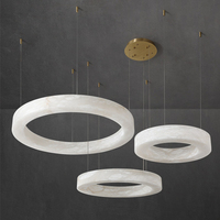 Lustre en marbre d'albâtre naturel et cuivre, design moderne et créatif, pour salon de villa minimaliste, salle à manger et chambre.