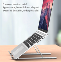 Support de bureau pour ordinateur portable en alliage d'aluminium réglable et pliable étanche et flexible pour une utilisation sur le lit ou la surface