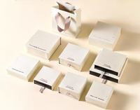 Boîte de rangement pour bijoux en kraft texturé rigide avec poignée, biodégradable et recyclable, imprimée en quatre couleurs