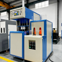 Petite machine semi-automatique de fabrication de bouteilles en plastique, machine de soufflage PET 500 ml