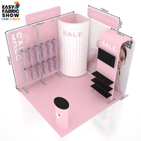 Stand d'exposition modulaire personnalisé en tissu tendu pour salon professionnel de vêtements, avec portants à vêtements et étagères à chaussures pour l'Expo Mode