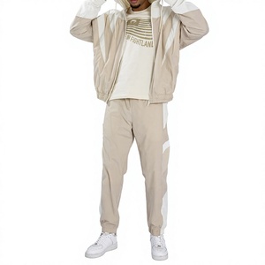 Veste coupe-vent décontractée à capuche pour homme avec blocs de couleur, en tissu polyester respirant, ensemble coupe-vent en vente en ligne - Product Image 1