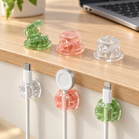 Organiseurs de câbles rotatifs avec clips à ressort et base adhésive pour le rangement des câbles de charge sur les bureaux et les tables de chevet dans les bureaux à domicile