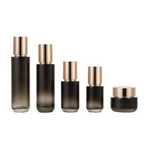 STELLAR PATH Luxury Beautiful Black Glass Cosmetics Packaging Set Gold Lid Face Cream Jars Lotion <b>Bottle</b> with Paper Tube - Product Image 1
