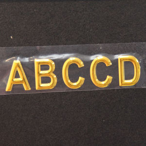 Etiqueta Adhesiva de Lujo 3D con <span class=keywords><strong>Logo</strong></span> Personalizado en Níquel Metálico Transparente por Transferencia UV y Termoadhesivo en Oro - Product Image 5